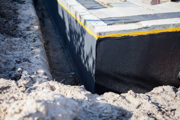 Professional Waterproofing technician working in Champlin, MN